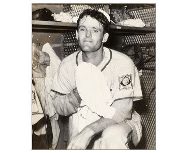 Tom Sunkel in the Cardinals locker room, 1939.